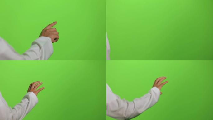 色度键绿色屏幕背景上的阿拉伯男性手触摸屏手势