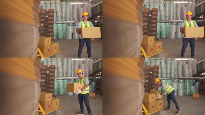 工人卸纸板箱在手在线订购，采购，电子商务商品。物流配送仓库。