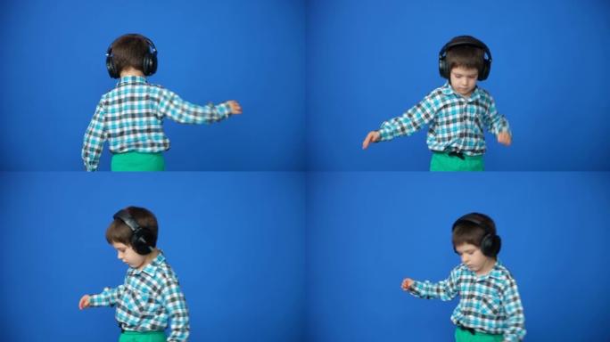 一个戴着耳机的男孩在蓝色背景上旋转，试图不摔倒
