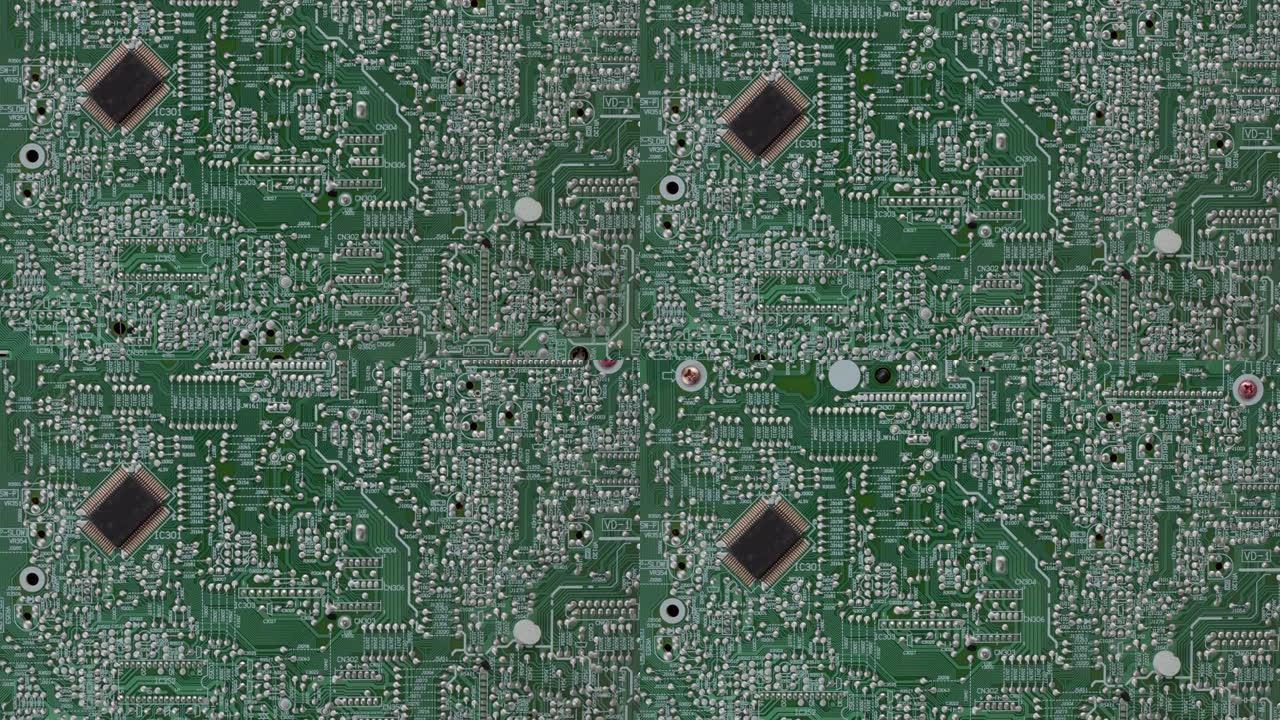 关闭复杂设备的绿色微芯片的俯视图。信息传递的许多焊接路径。各种电子设备的概念，拆卸的设备。