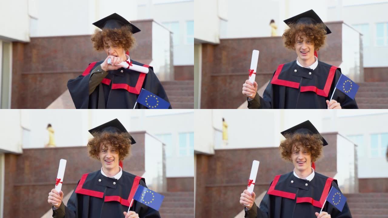 一个硕士生的卷发滑稽毕业生拥有完成学业的文凭和欧盟的旗帜，并打哈欠
