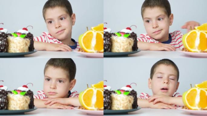 一个小男孩选择吃什么-蛋糕或水果