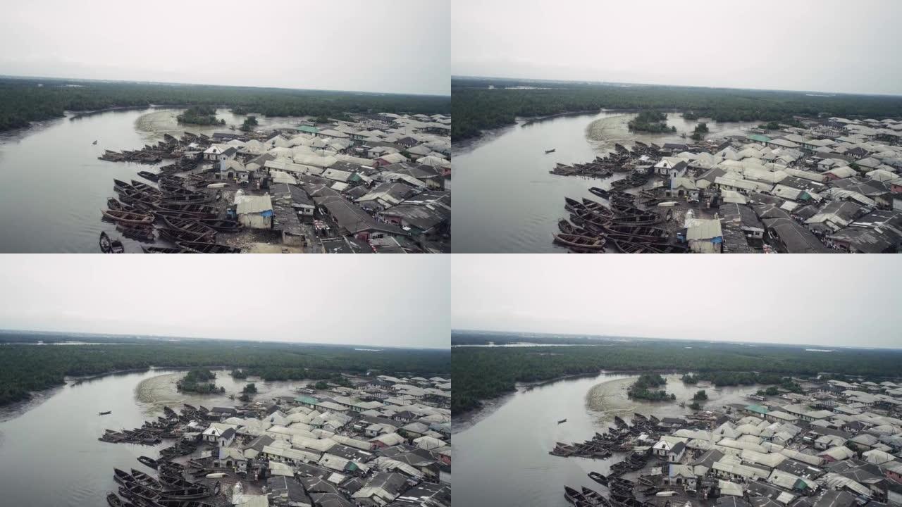 尼日利亚博罗基里河州无人机射击。河边，当地船，原油，小溪，马格罗维