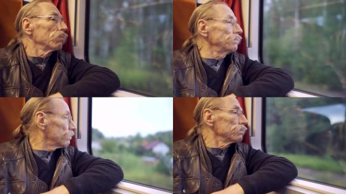 戴眼镜的老人坐火车旅行，早上看着窗外