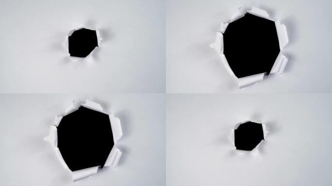 圆形撕纸停止运动，用于复制空间。视频效果叠加的撕纸动画