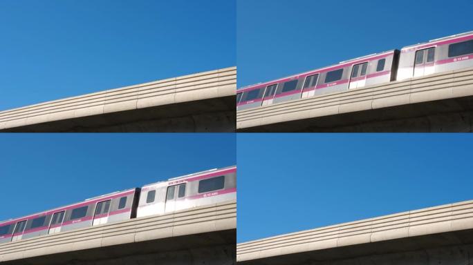 高架桥上的地铁列车迅速通过，发出噪音