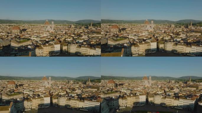 午后阳光下老城的空中降拍。塔楼和圆顶突出于城镇发展。意大利佛罗伦萨