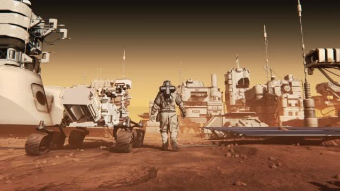 身穿太空服的宇航员自信地与毅力火星探测器一起在火星上行走。被岩石覆盖的外星红色星球。火星上的第一位宇