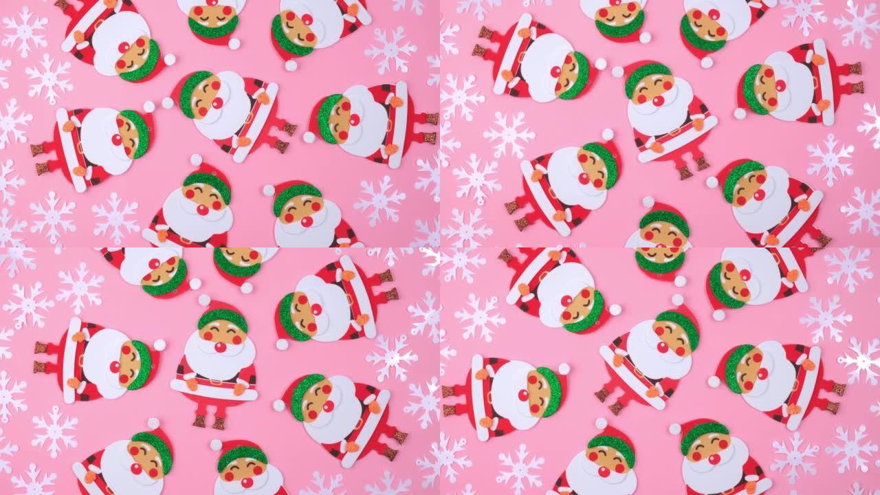 圣诞老人的新年风格化人物在雪花的粉红色背景上旋转。顶视图。4k。