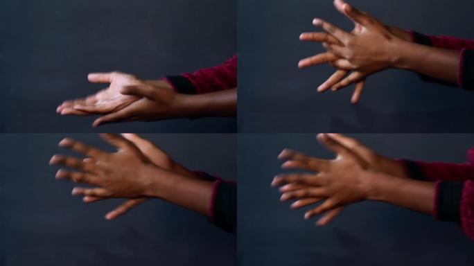 黑人非洲人演示了适当的洗手以进行4K卫生射击