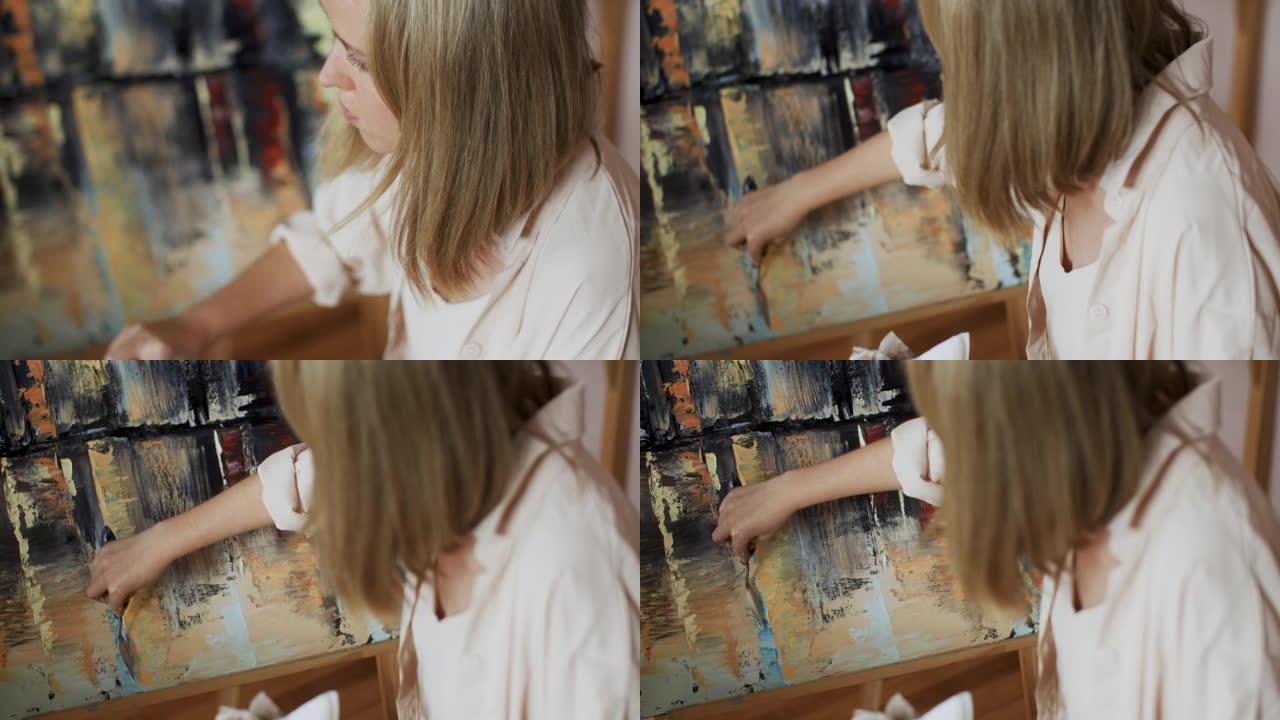 自信的艺术家在画布上用油画绘画的特写
