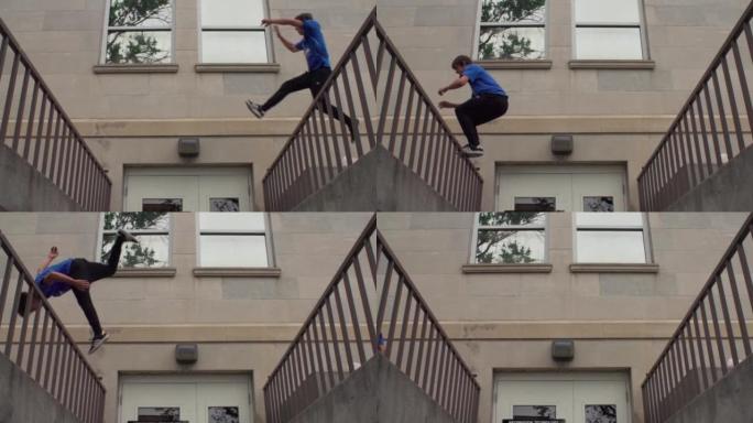 年轻男性做跑酷，在栏杆之间跳跃，做把戏