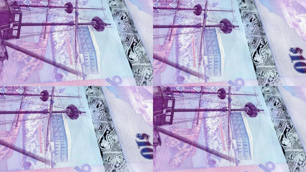 百慕大百慕大元10纸币，十百慕大元，百慕大元的特写和宏观视图，跟踪和多莉拍摄10百慕大元纸币观察和储