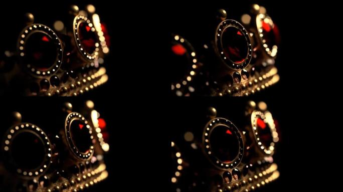 黑色背景上带有红宝石的金色皇冠3D 4k循环动画，带有复制空间