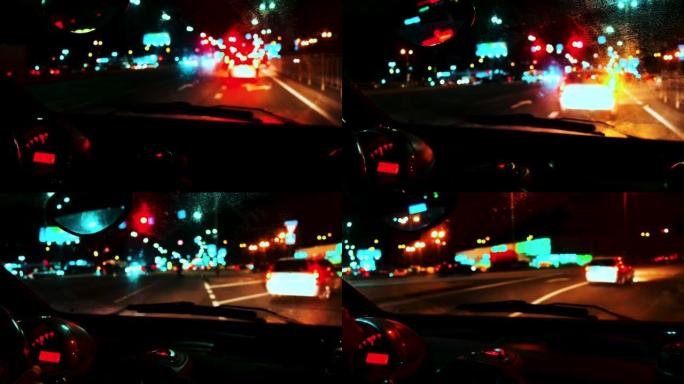 从汽车挡风玻璃上看。晚上沿着高速公路行驶，右转