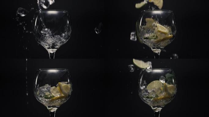 冰块柠檬掉落空的酒杯特写。清爽饮料概念