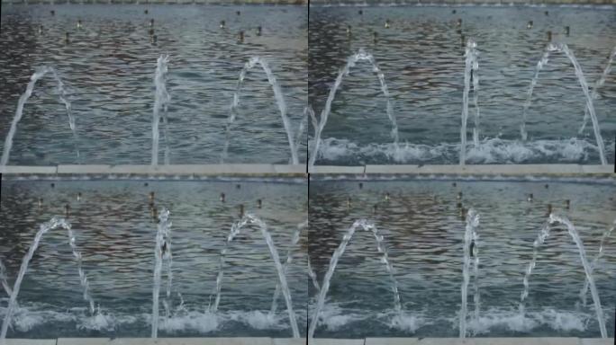 打开水并倒入喷泉的特写镜头