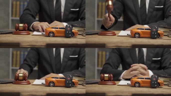 桌子上的汽车拍卖创意法官锤子带特写文件的玩具车，4k电影