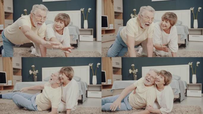 一对非常好的老年夫妇正在做体操和大笑。夫妻。瑜伽。好心情。真实的情感。可爱的幸福家庭。热爱生活。奶奶