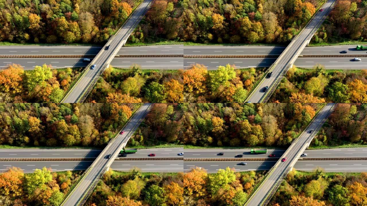 在与过往车辆桥接高速公路的道路交叉口处的交通鸟瞰图