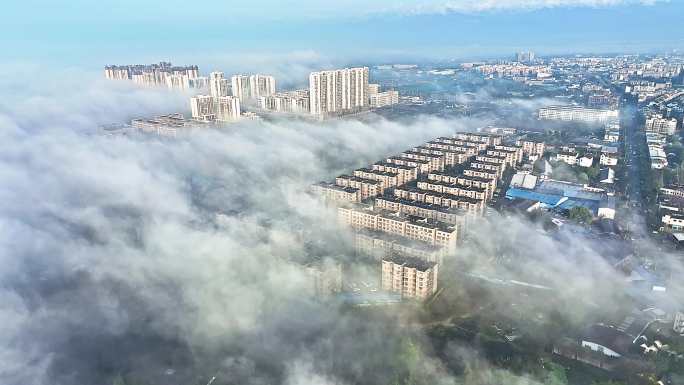 航拍城市上空唯美平流雾云海人间仙境