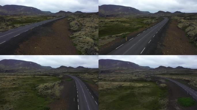 冰岛穿越山谷的道路的鸟瞰图。