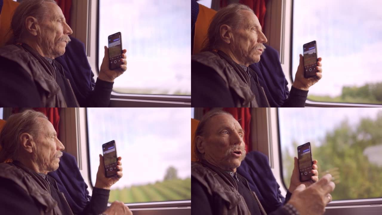 老人乘火车旅行，并使用智能手机通过窗户拍照