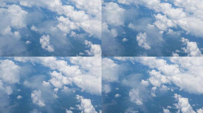 透过飞机窗户看穿云高空天空俯瞰鸟瞰