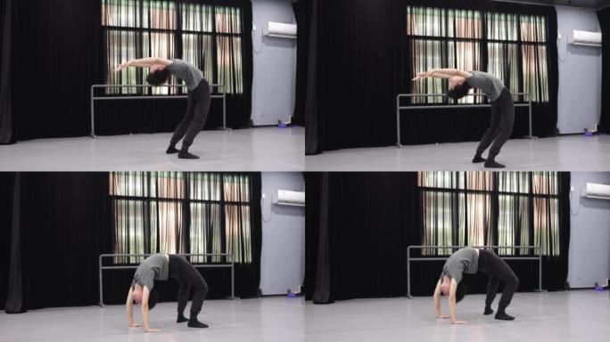 一名中国男子在舞蹈室接受舞蹈技巧训练