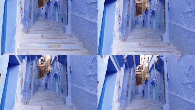 摩洛哥Chefchaouen带有蓝色油漆楼梯和房屋的街道细节。Chefchaouen的麦地那是著名的