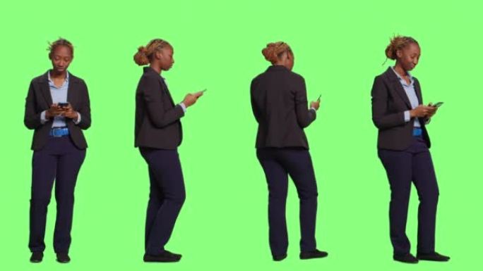 使用智能手机的女商人提供全身绿屏背景