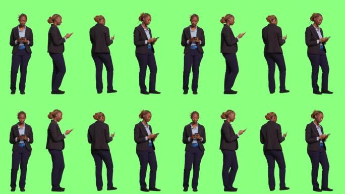 使用智能手机的女商人提供全身绿屏背景