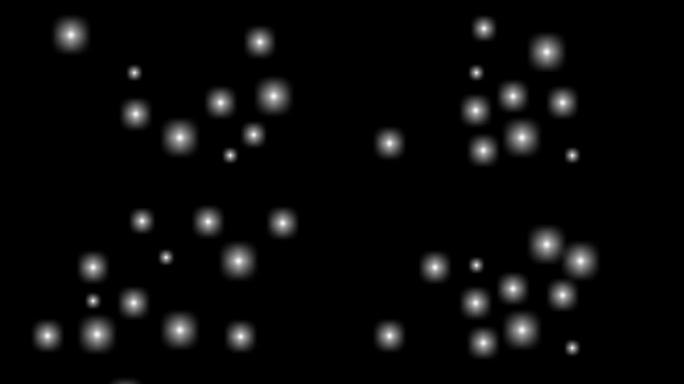 黑色背景上随机闪烁的白光。