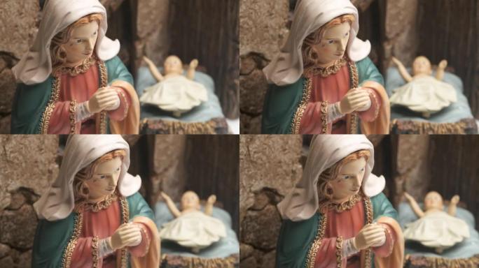 圣母玛利亚和小耶稣的旧雕像，(焦点是圣母玛利亚)