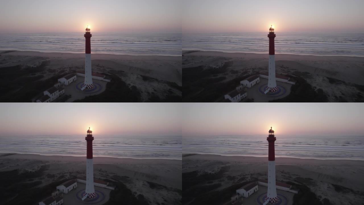 在法国滨海夏朗德省的夕阳下，拉库伯灯塔的空中多莉镜头