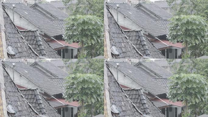 农村地区遭受小雨袭击的粘土房屋屋顶的俯视图