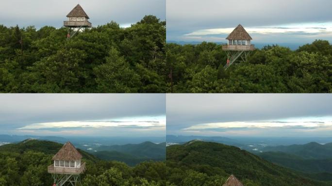 森林山上的watch望塔的空中无人机镜头