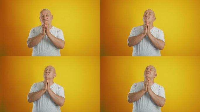 Bald Senior Male Is Praying For Good Health On Yel