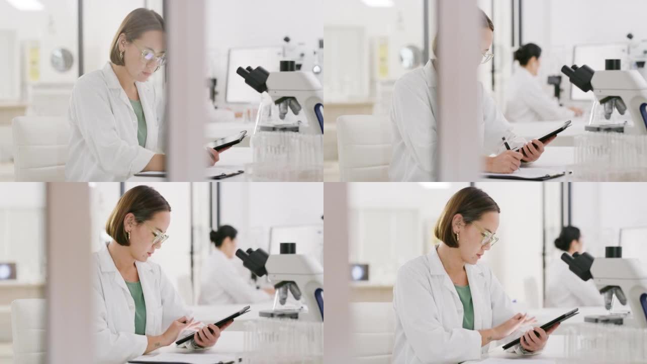 女科学家，平板电脑或笔记本写作，用于科学研究，医学搜索或实验室创新理念。医学、保险或分析实验室的医生