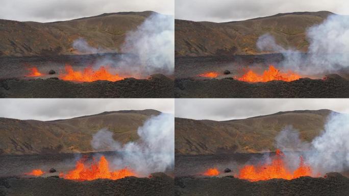 冰岛山上熔岩喷发和流出的航拍视频
