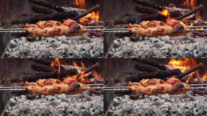 火上浇油的烤串上令人垂涎的鸡翅特写