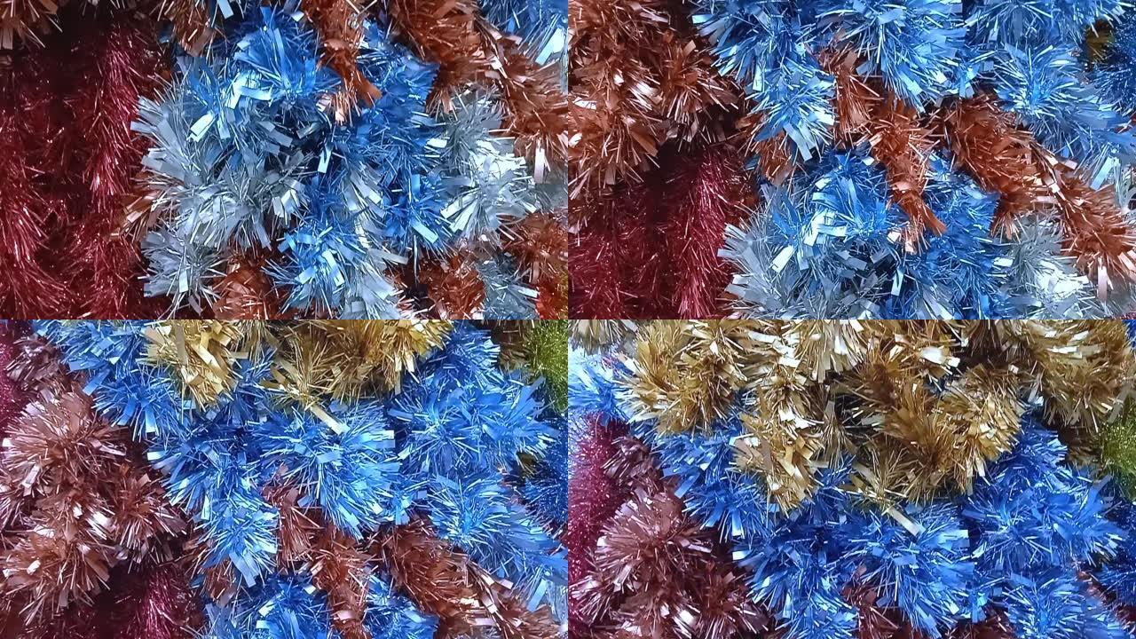 红色和蓝色闪闪发光的金属丝 -- 闪闪发光的圣诞装饰品 -- 商店的季节性装饰