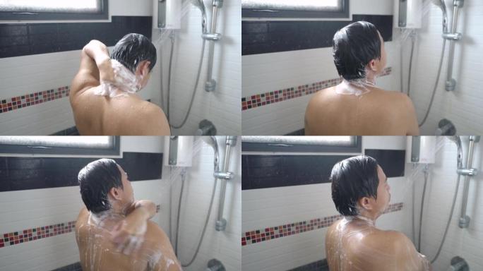 亚洲男子在浴室洗头和洗澡。