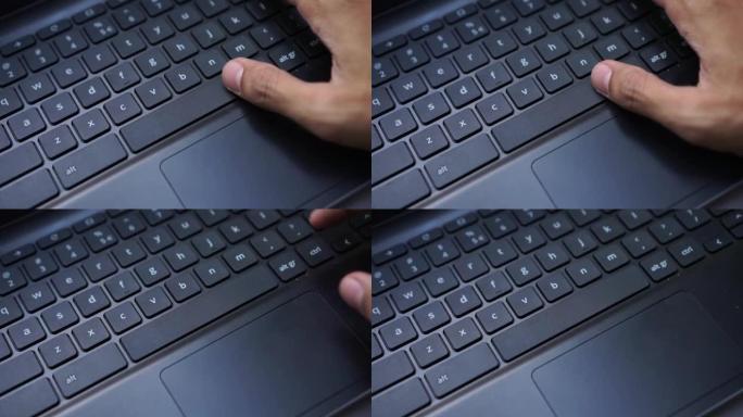 用右手拇指按下笔记本电脑键盘上的空格键。