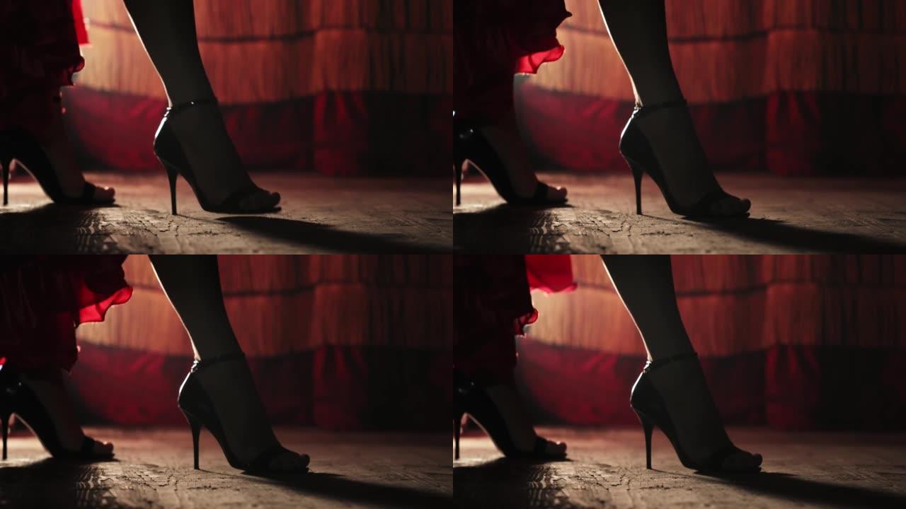 一个穿着漂亮高跟鞋的女人的腿敲打着地板