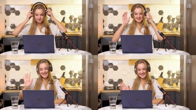 年轻女子正在家庭工作室的麦克风中讲话，开始为在线博客录制播客。