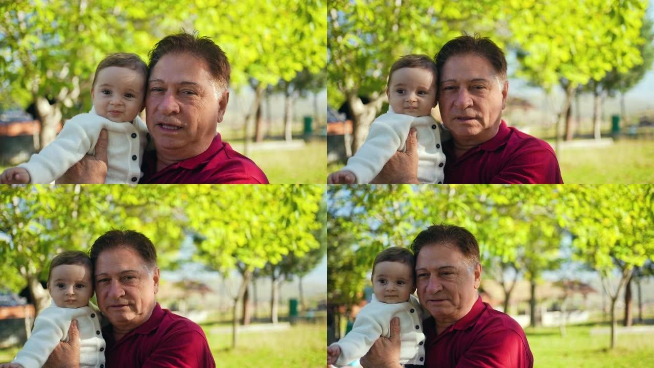 祖父在野餐时拥抱他的侄子