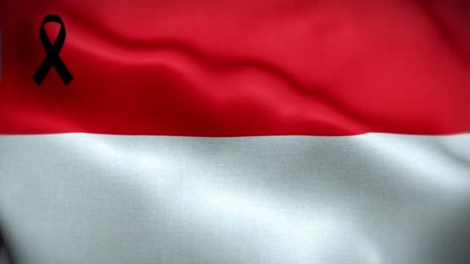 印有黑丝带的4K印尼国旗。印度尼西亚哀悼和提高认识日。有质感的织物图案高细节的循环。