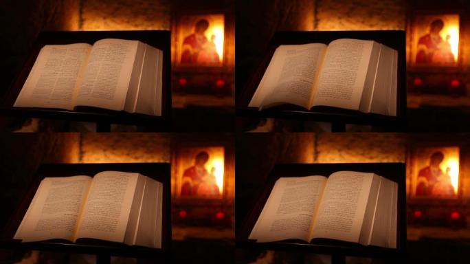 在一座古老的教堂里，一本打开的阿拉伯冬青圣经，空气掀翻了一页
