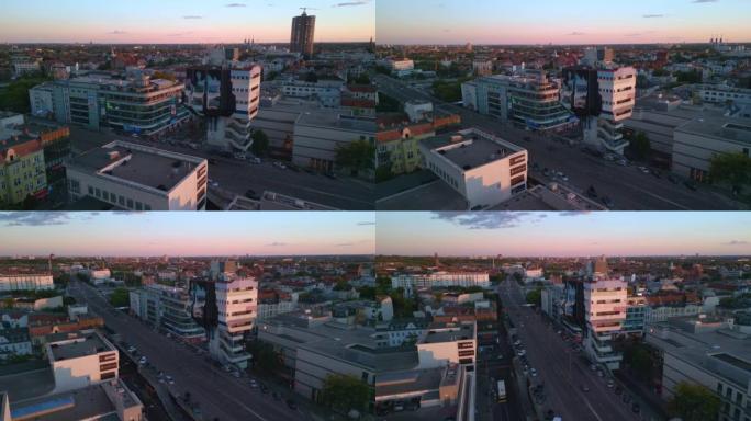 黄金时段的天际线德国城市。柏林城市的平滑鸟瞰图飞行